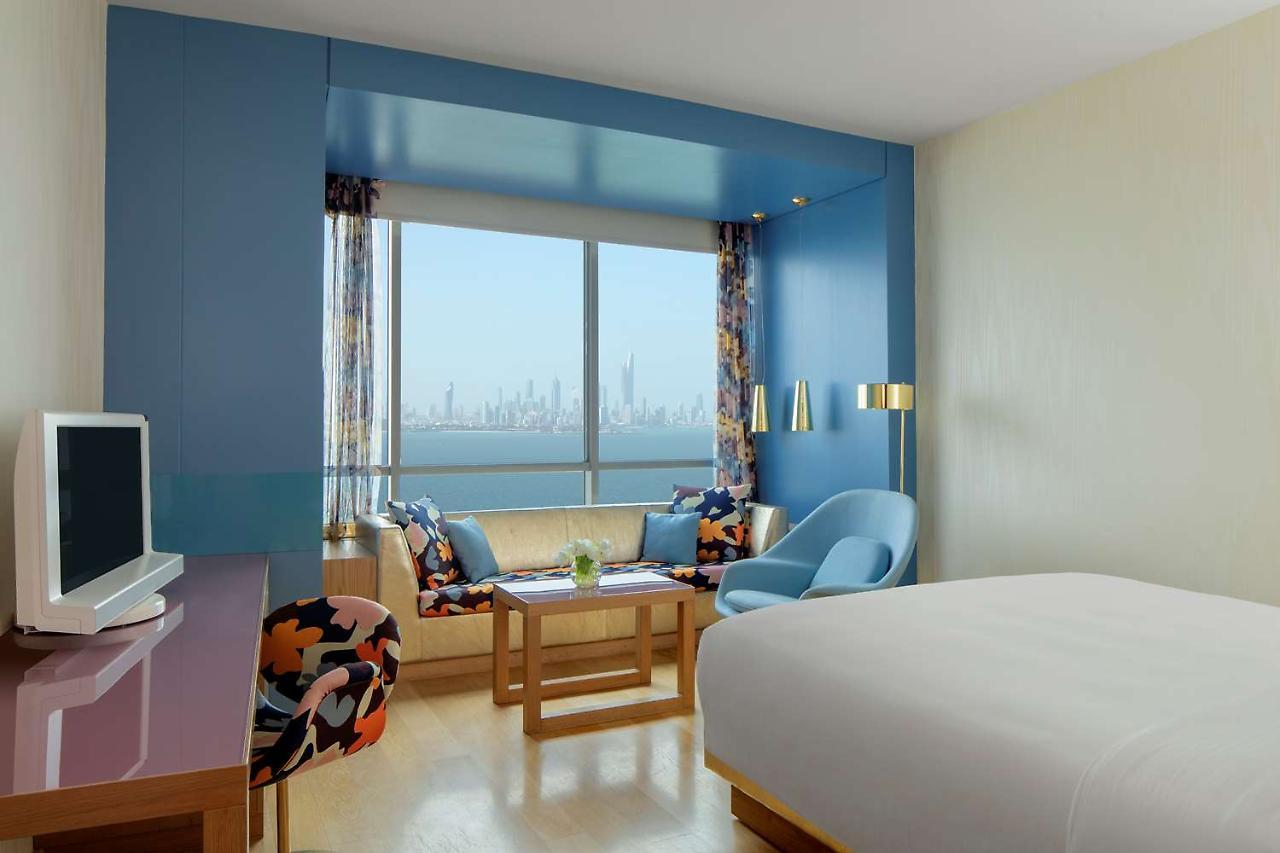 Symphony Style Hotel Kuwait Salmiya Luaran gambar A room at the hotel