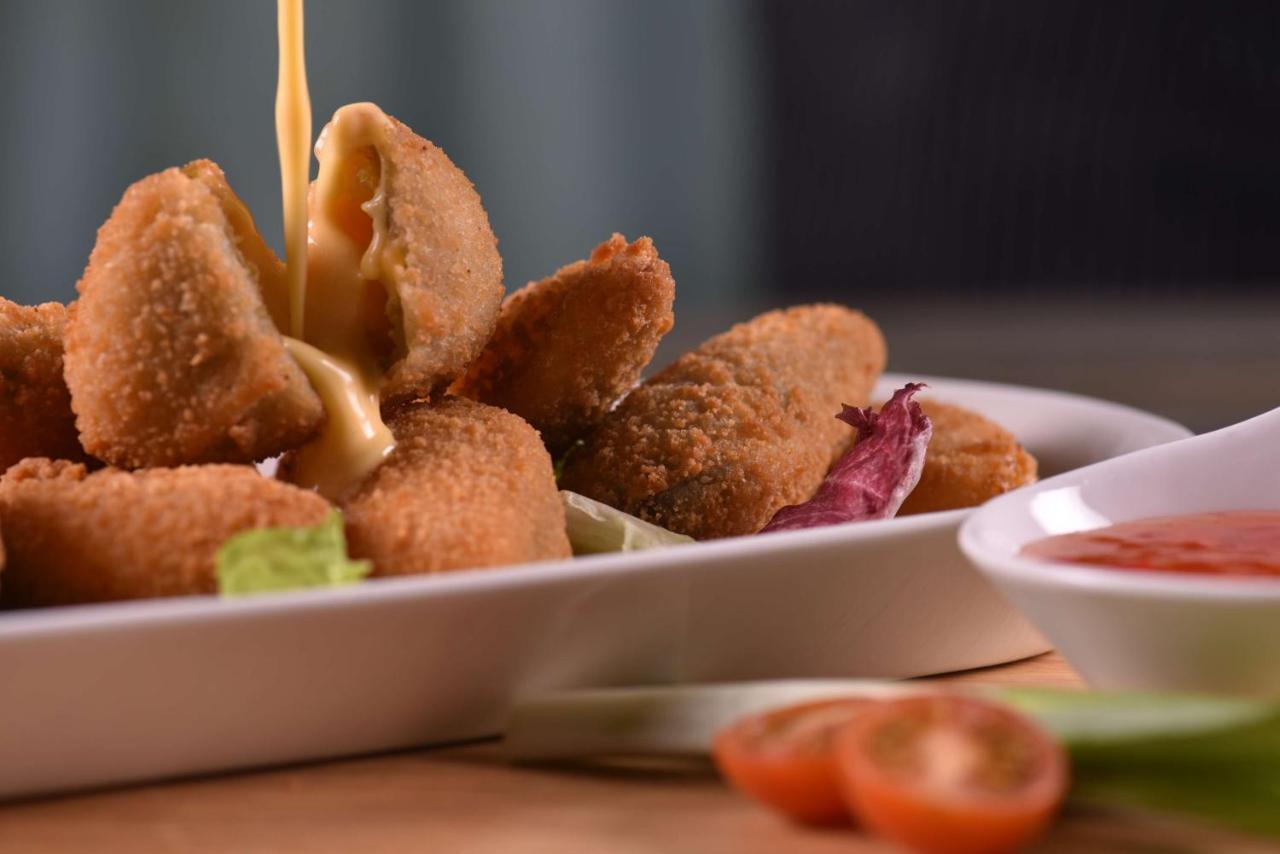 Symphony Style Hotel Kuwait Salmiya Luaran gambar Coxinha
